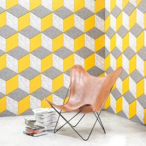 Panneau acoustique mural CUBUS avec motif en cubes dans un espace détente