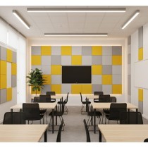 Panneaux muraux acoustiques Quadra gris et jaunes installés dans une salle de classe moderne et lumineuse.